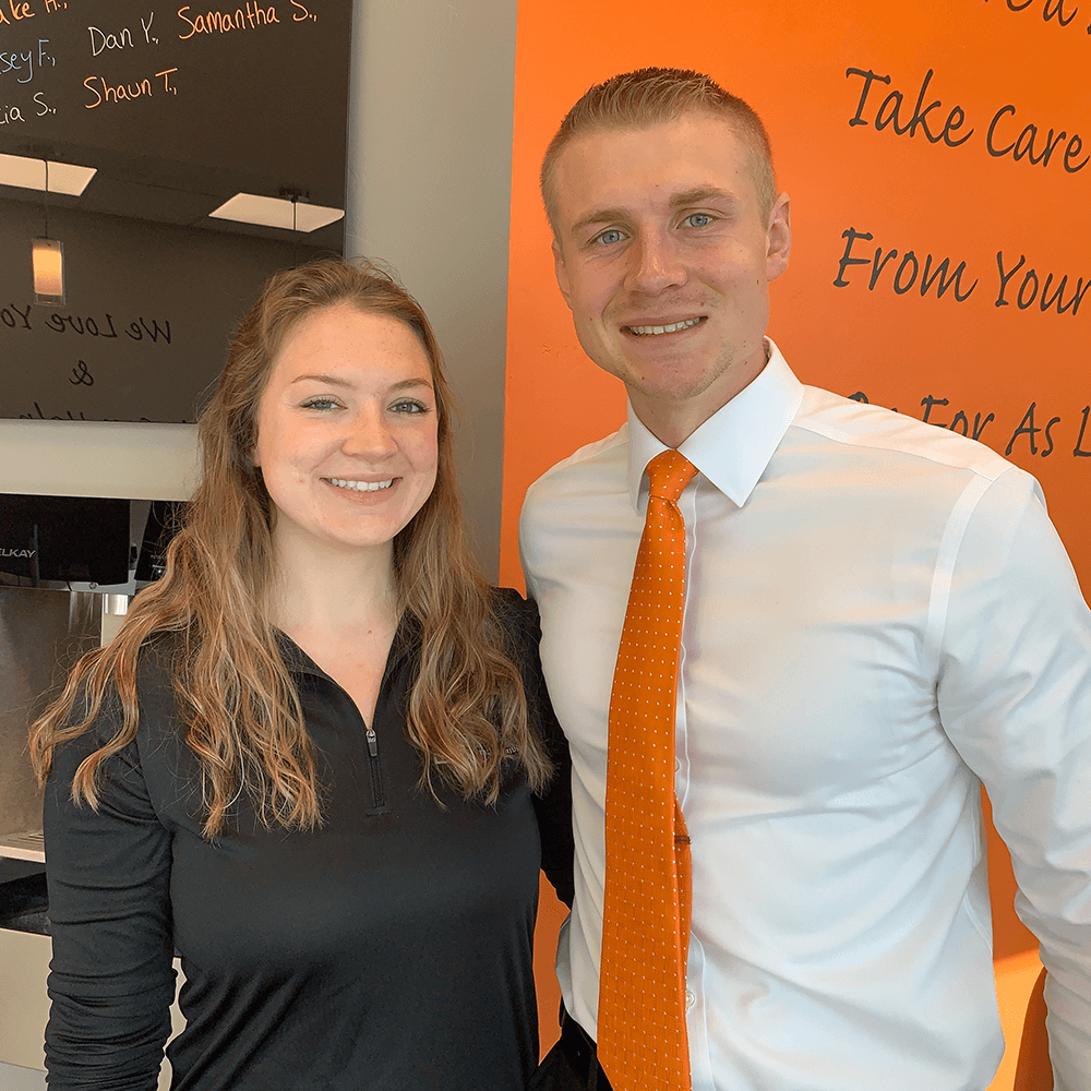chiropractor doctor with female patient