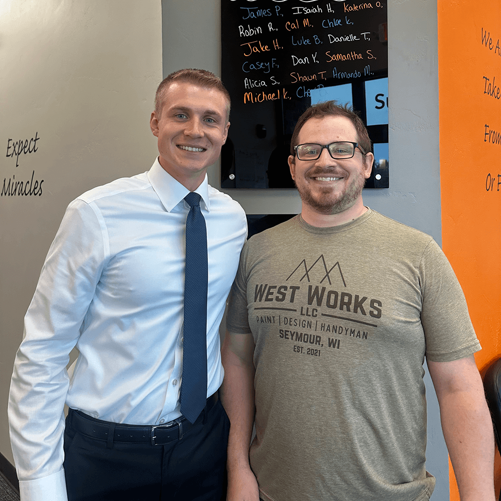 chiropractic care doctor in green bay working with male patient